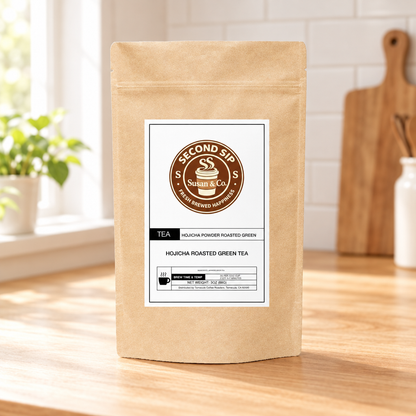 Hojicha tea pouch on a warm wooden kitchen table
