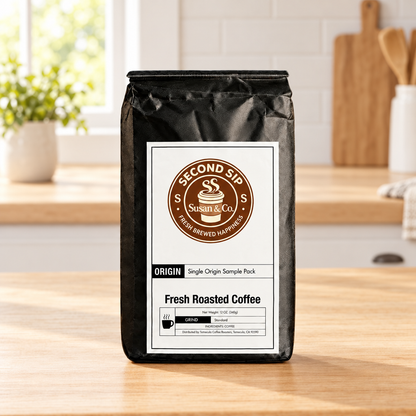 Single Origin Favorites Sample Pack coffee bag on a light wood kitchen table